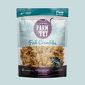 Fish crumbles cat treat pouch with teal top and purple branding, filled with brown crumbles