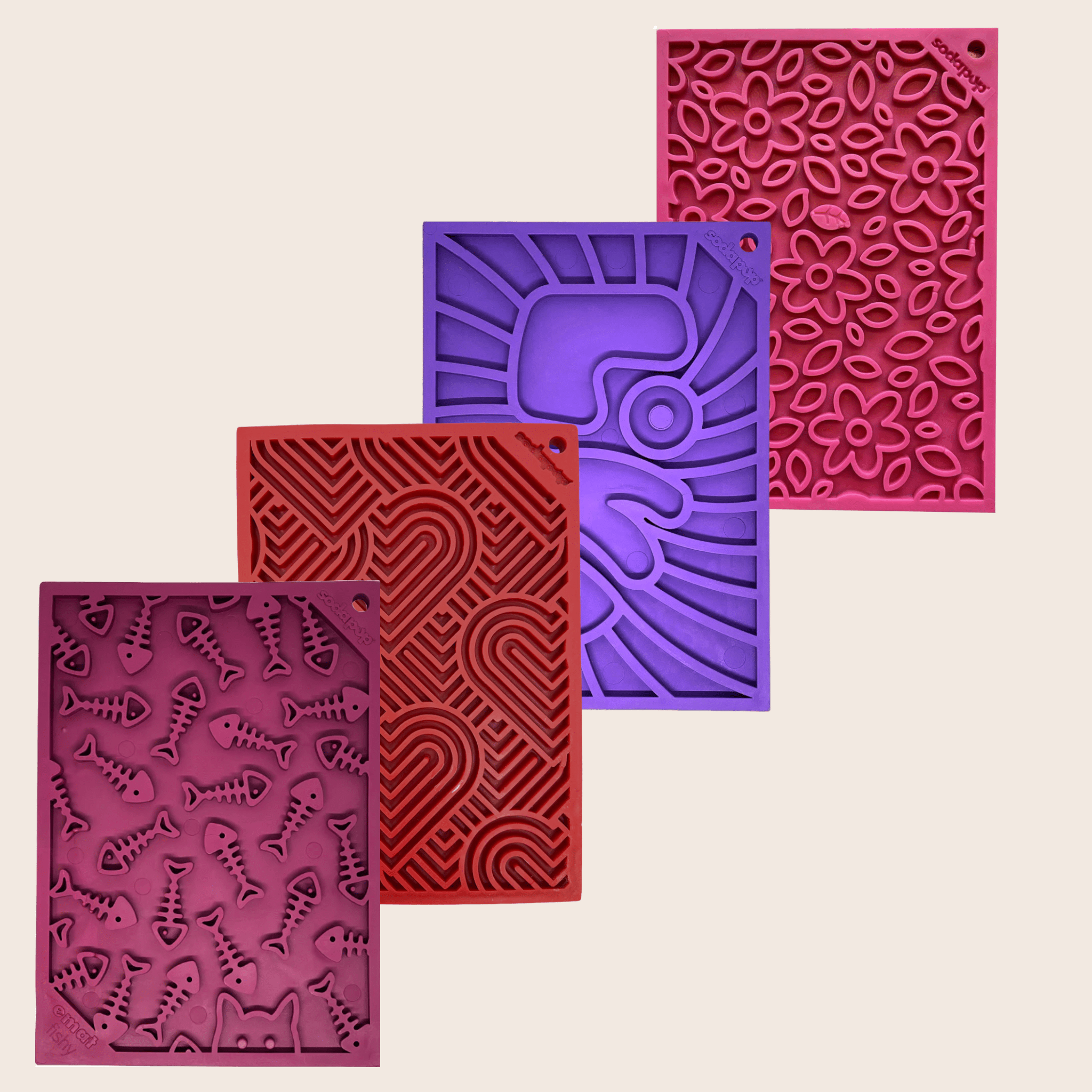 Assorted textured lick mats set with fishbone, flower, and hearts patterns
