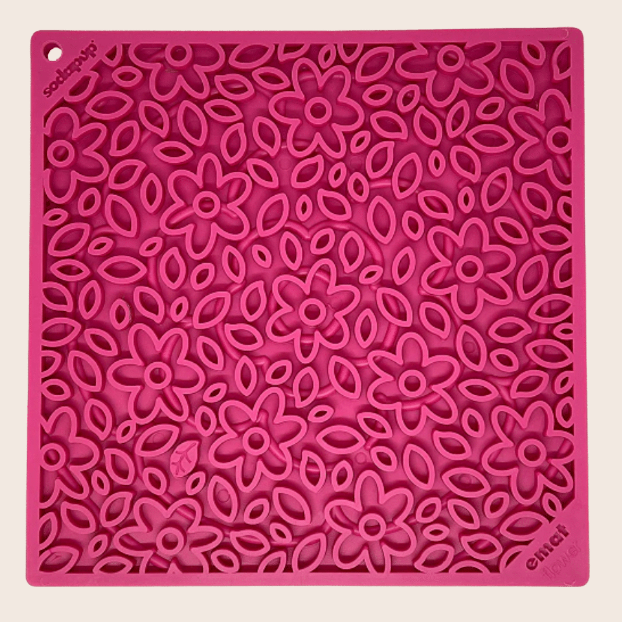 Pink flower-pattern dog lick mat with raised silicone petals and shapes