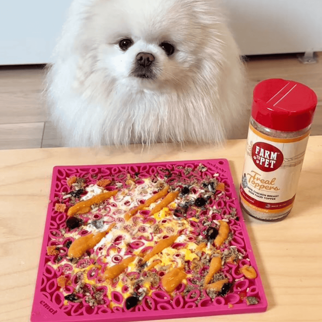 Red heart-pattern dog lick mat with raised grooves, square silicone tray.