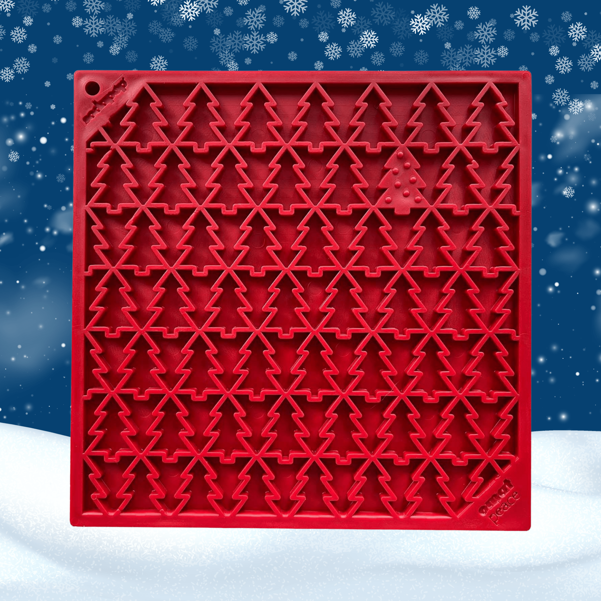 Red silicone lick mat with raised tree pattern and suction cup holes