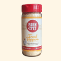 Chicken dog food topper jar with red cap and Farm to Pet label