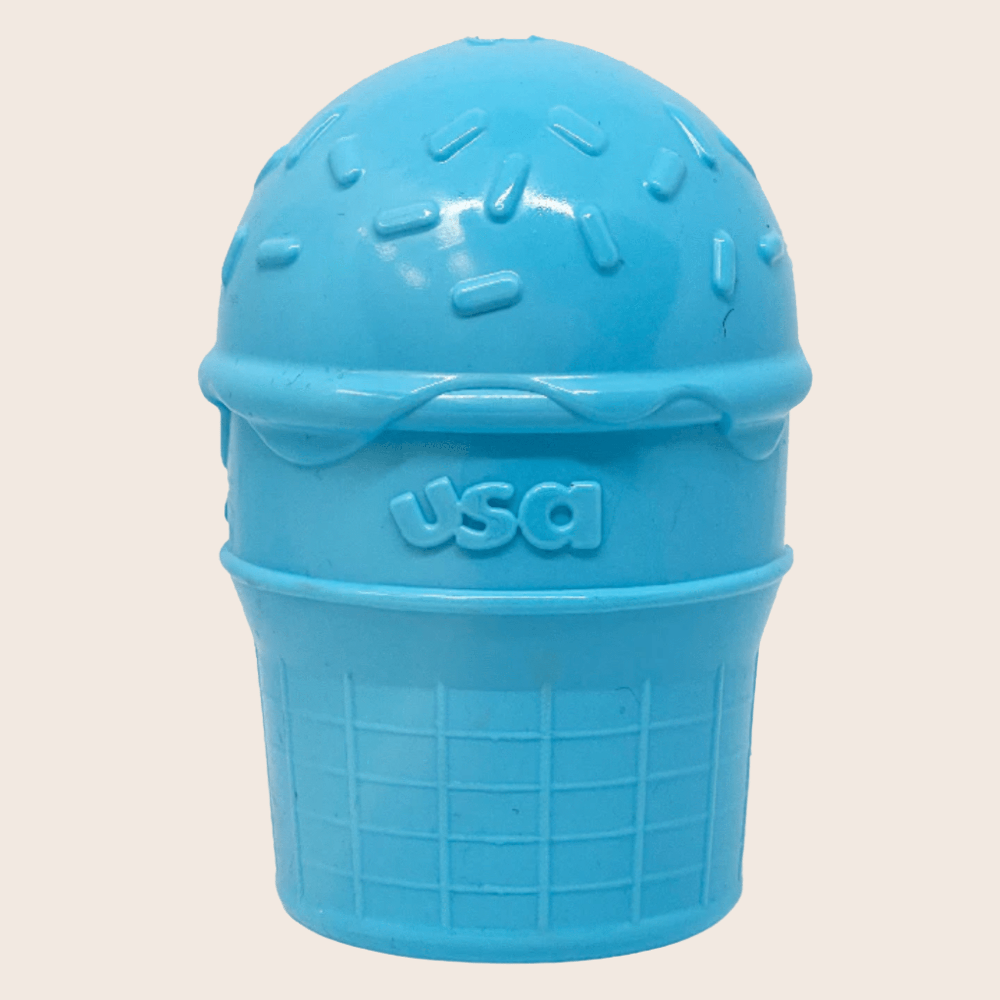 Blue ice cream cone dog treat dispenser with raised USA text on the lid.