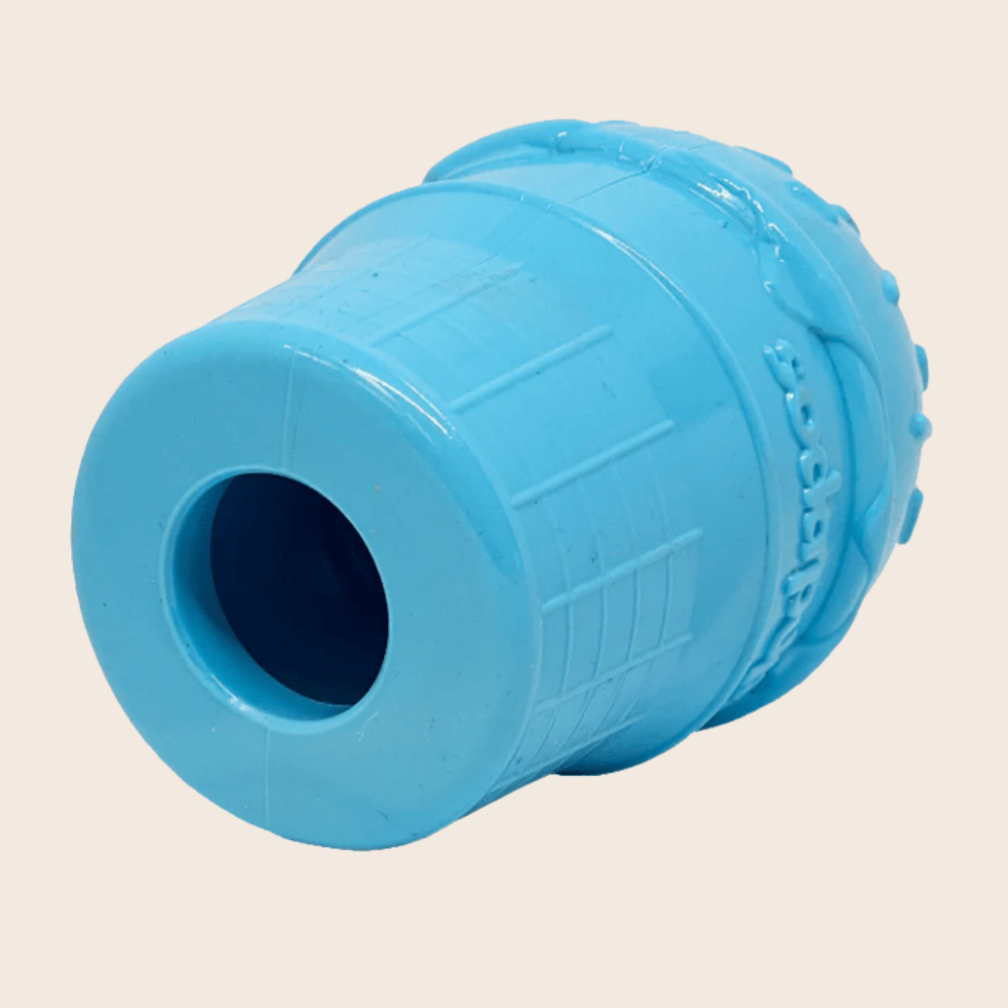 Blue ice cream dog treat dispenser viewed from the side with wide opening.