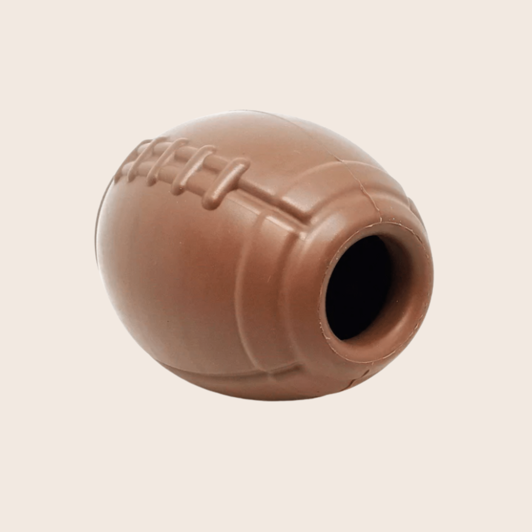brown ball-shaped dog treat dispenser with a side opening for treats