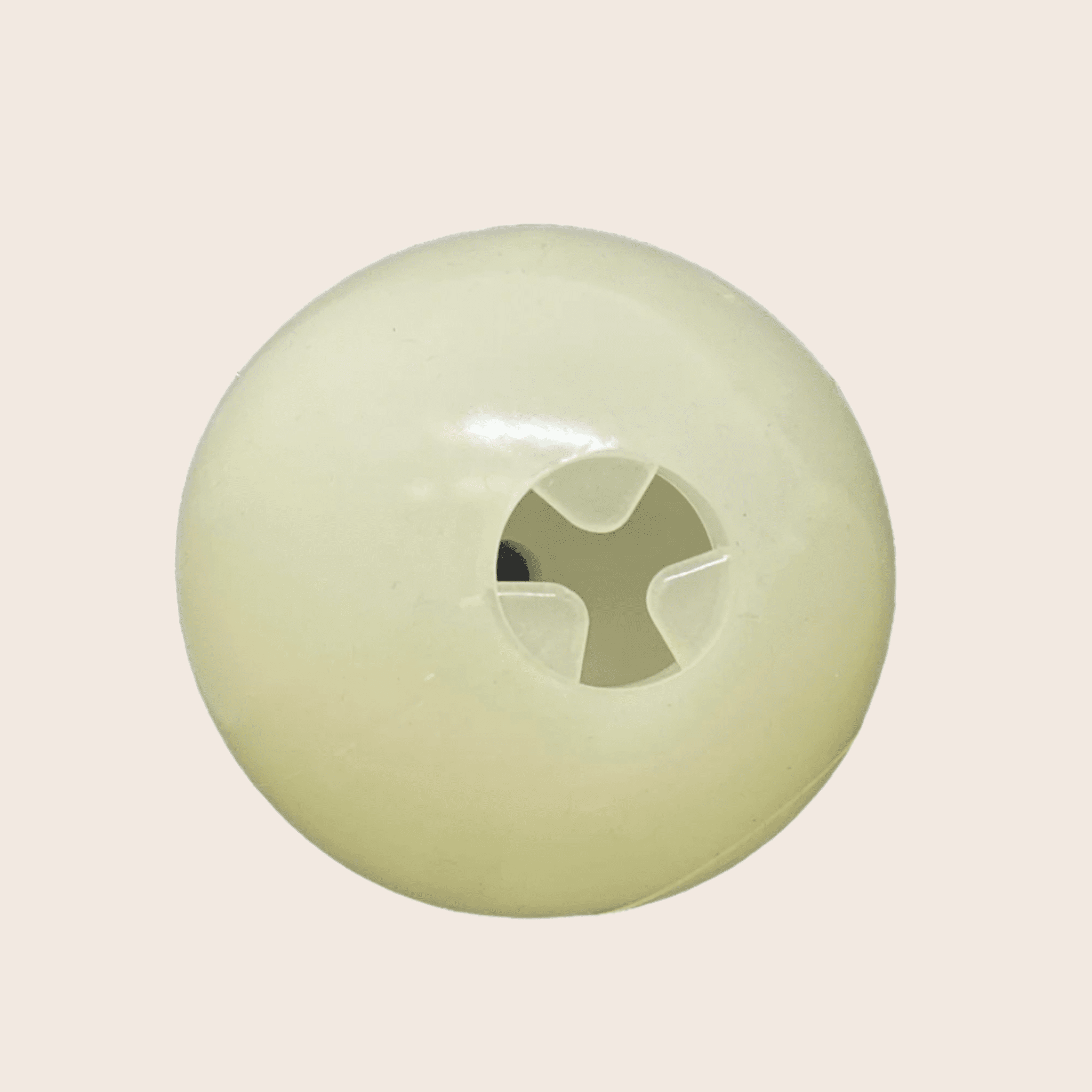 Dog treat dispenser ball, pale green glossy with treat-opening holes