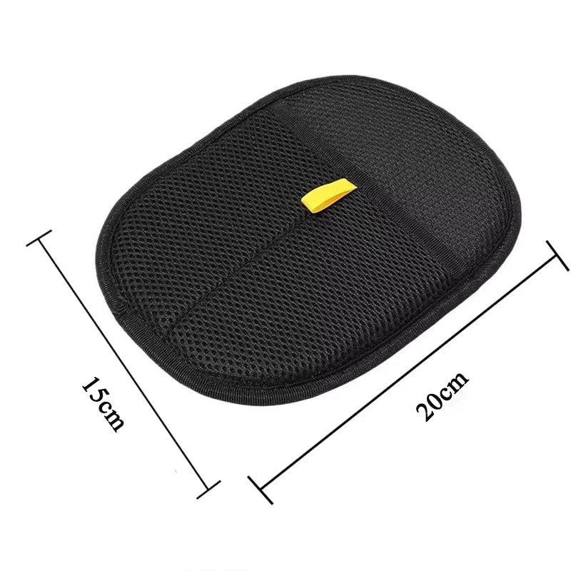 Black grooming glove with textured mesh palm and neon yellow tab; 20cm x 15cm