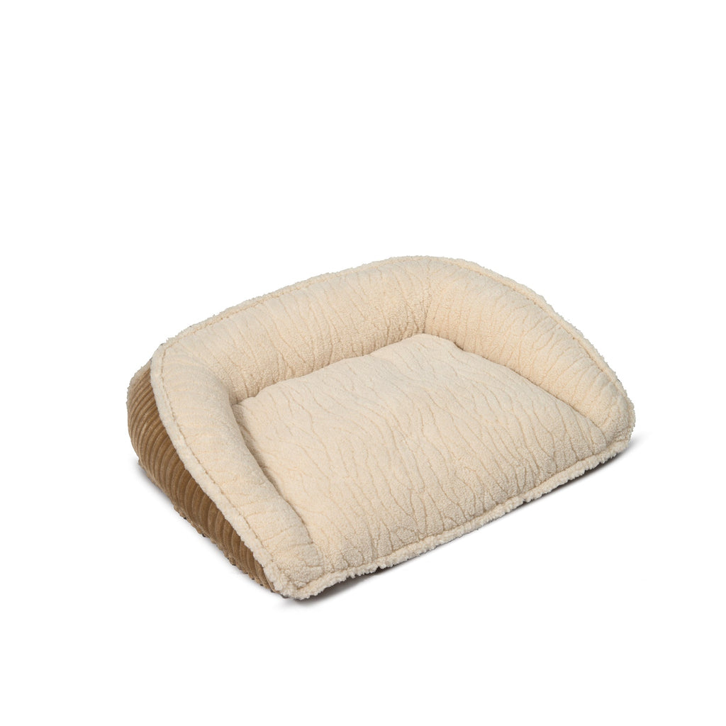 Khaki bolster dog bed with raised padded bolster sides