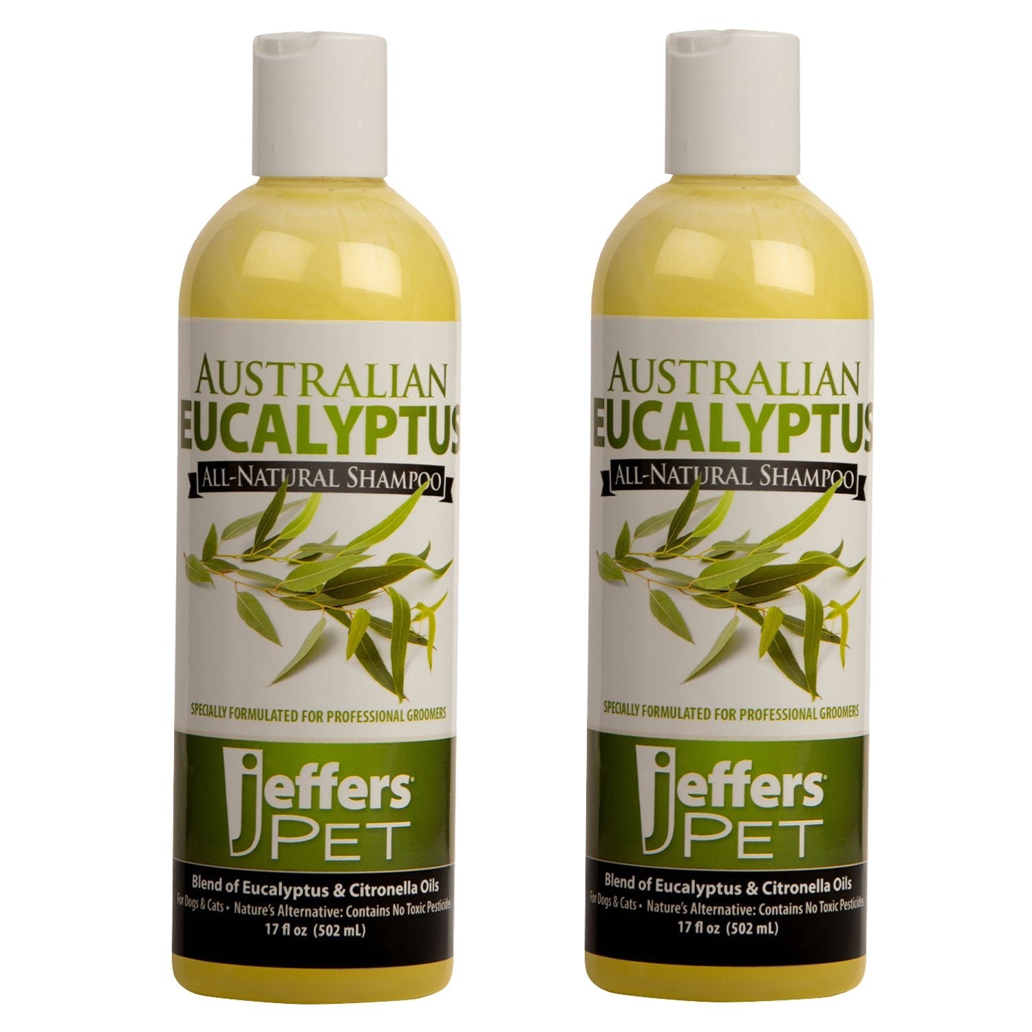 Two eucalyptus dog shampoo bottles, amber liquid, white caps, green plant labels