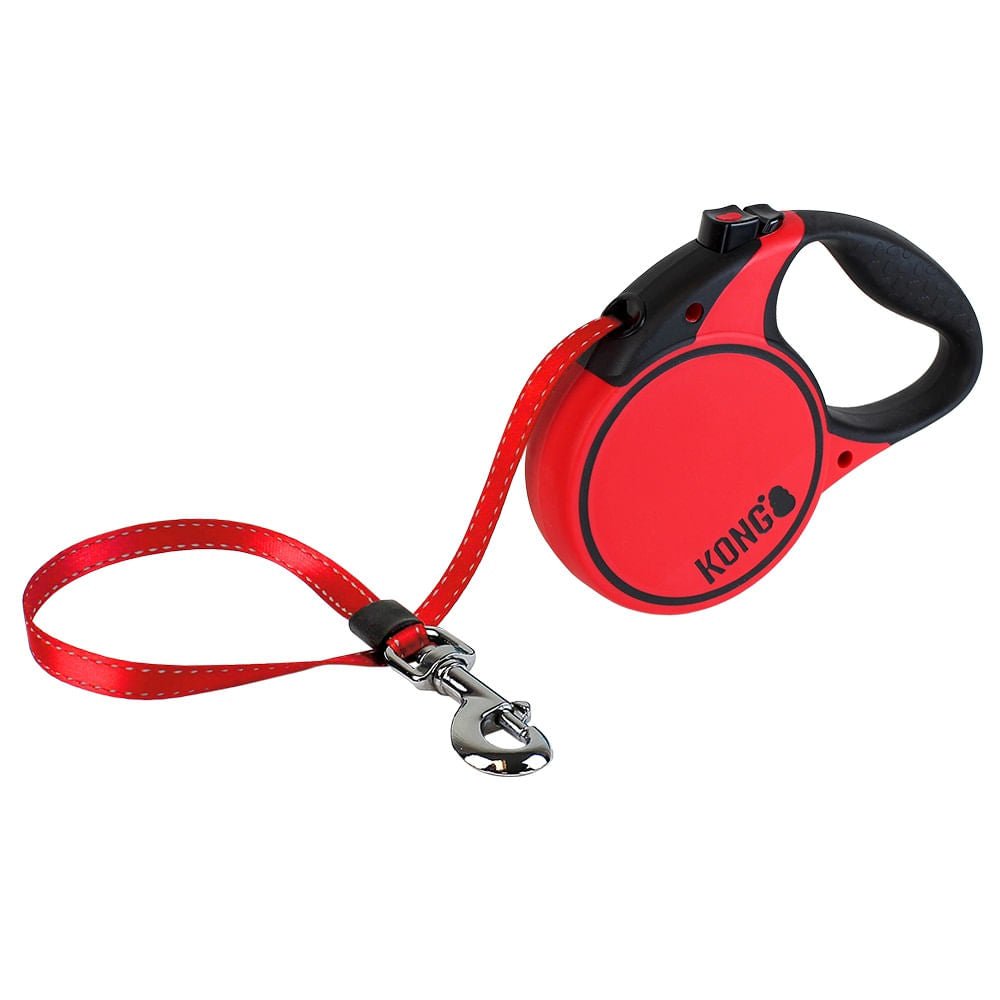 Red retractable dog leash with textured black grip, red strap, and metal snap clip