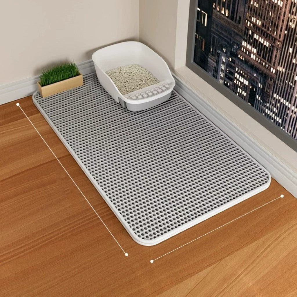 Double-layer EVA cat litter pad, gray hex-pattern mat with rounded corners.