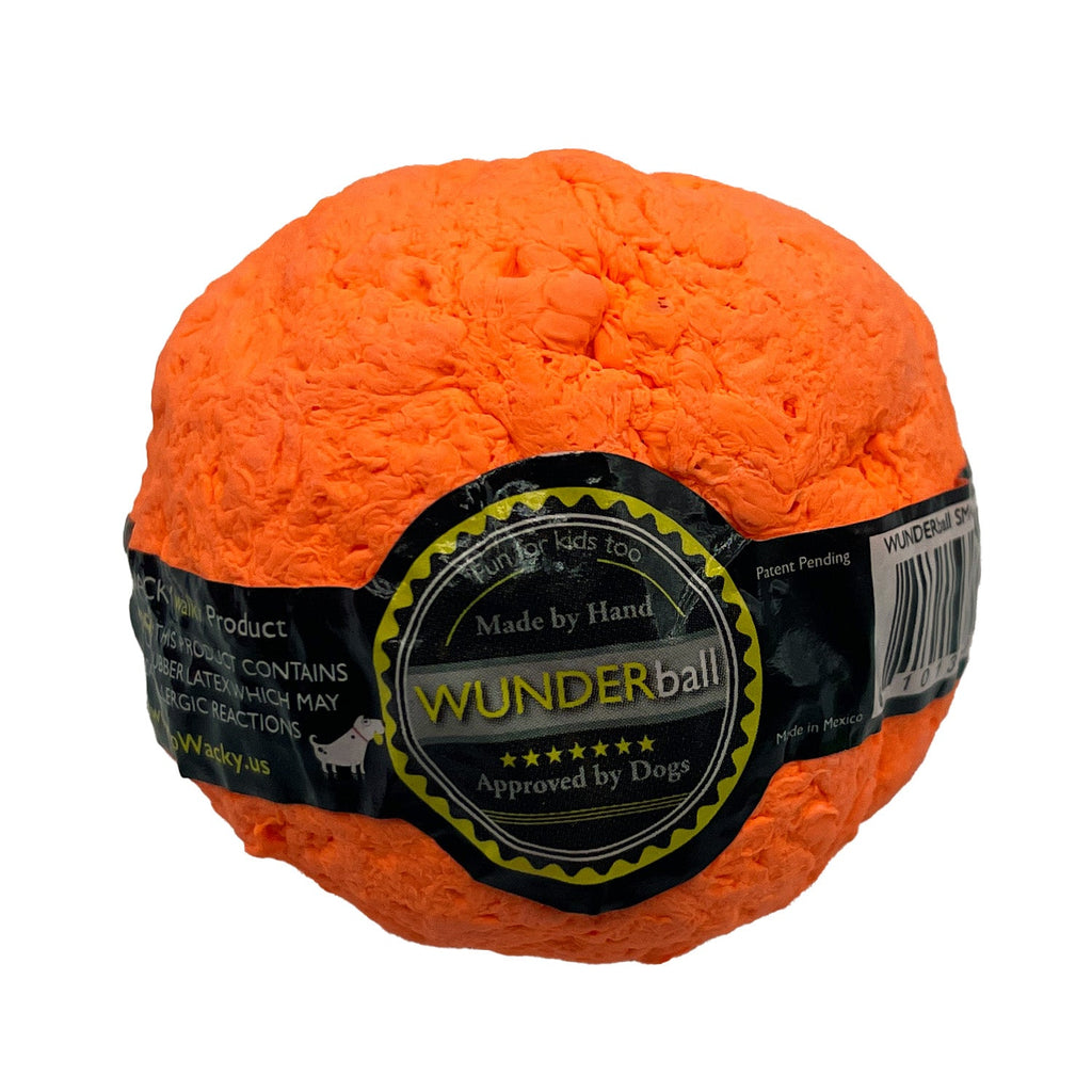 Orange textured fetch ball with black label band and round approval badge