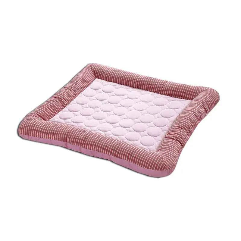 Pink pet cooling mat with gray striped border and pale pink textured surface